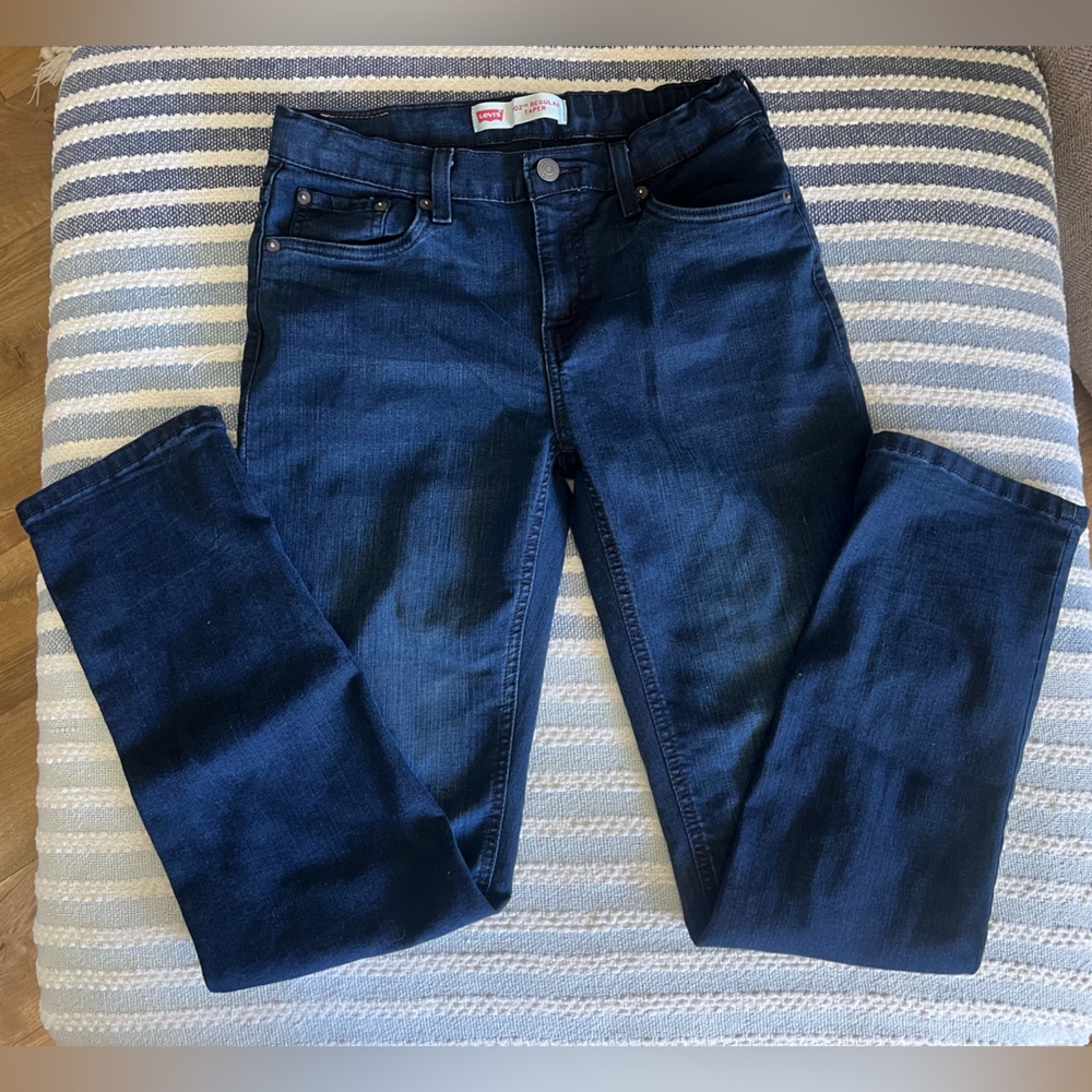 Levi's 502 dark blue denim jeans.